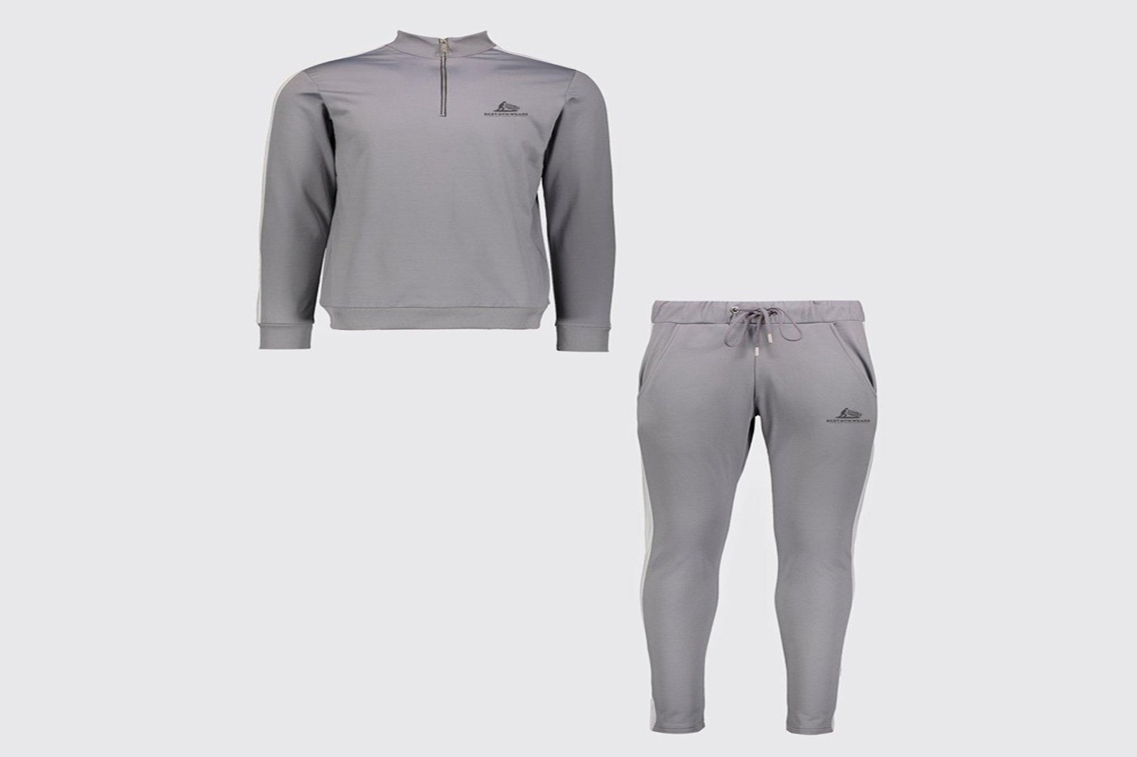 Grey tracksuit set with hoodie and matching joggers.