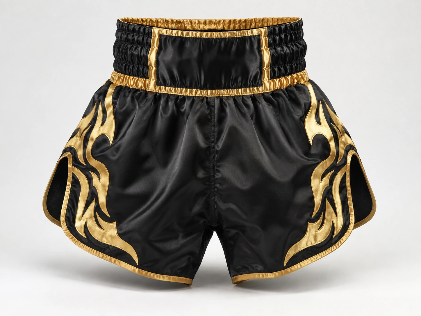 Premium muay thai shorts with satin fabric, tall elastic waistband, wide leg openings and reinforced side slits